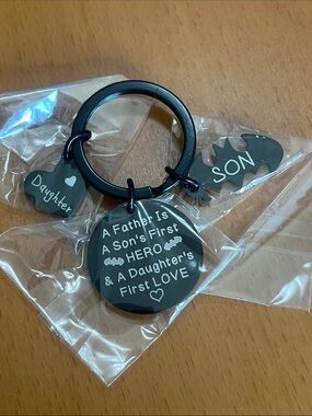 New Father Is A Son's First Hero & Daughter's First Love Keychain - Black